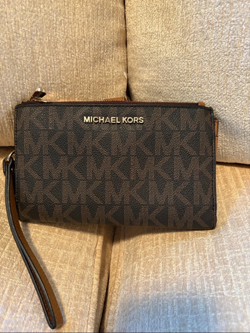 MICHAEL KORS Dark Brown Logo Wristlet with Gold Hardware